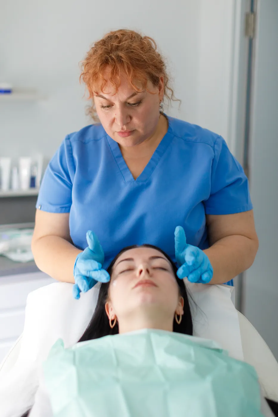 Dr Tania assessing the whole face before a treatment plan, Cosmetic Medicine Birchington